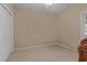 Compact bedroom with neutral carpet, a closet, and a peek at a wood desk at 100 Lazy Willow Ln. # 103, Myrtle Beach, SC 29588