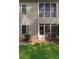 A ground-level view showcasing the exterior of the home and screened in back patio at 100 Lazy Willow Ln. # 103, Myrtle Beach, SC 29588
