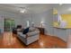 Inviting living room showcasing hardwood floors, stylish furniture, and open layout at 100 Lazy Willow Ln. # 103, Myrtle Beach, SC 29588