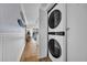 Efficient stacked washer and dryer are conveniently located near the hallway with additional storage at 1012 N Waccamaw Dr. # 1107, Murrells Inlet, SC 29576