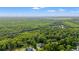 Expansive aerial view of a lush, green landscape with scattered homes and winding roads at 1051 Academy Dr., Conway, SC 29526