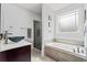 Bathroom features include separate tub and shower with a modern vanity at 1051 Academy Dr., Conway, SC 29526