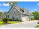 Charming two-story home featuring a brick and vinyl exterior, complemented by a well-maintained lawn at 1051 Academy Dr., Conway, SC 29526