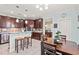 Kitchen with bar stool seating, stainless steel appliances, and a dining area nearby at 1051 Academy Dr., Conway, SC 29526