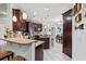 Kitchen featuring granite countertops, stainless appliances, and bright white tile flooring at 1051 Academy Dr., Conway, SC 29526