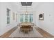 Bright dining room featuring a wooden table, white walls, and natural lighting at 1058 East Isle Of Palms Ave., Myrtle Beach, SC 29579