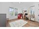 Bright playroom with natural light, hardwood floors, and space for creative activities and storage at 1058 East Isle Of Palms Ave., Myrtle Beach, SC 29579