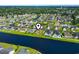 An inviting lakeside community with well-maintained homes and beautiful landscaping near a tranquil lake at 1068 Lizzie Ln., Surfside Beach, SC 29575