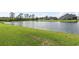 A tranquil pond provides a picturesque backdrop to the lush backyard at 1068 Lizzie Ln., Surfside Beach, SC 29575