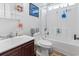 Bright bathroom with a shower-tub combo, sleek vanity, and natural light at 1068 Lizzie Ln., Surfside Beach, SC 29575