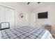 Bedroom with vaulted ceiling, mounted TV, and double closets for plenty of storage space at 1068 Lizzie Ln., Surfside Beach, SC 29575