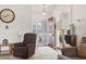 Cozy living room featuring neutral carpet, a comfortable recliner, and a view of the entryway at 1068 Lizzie Ln., Surfside Beach, SC 29575