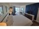 Bright bedroom with ocean views from the balcony and an accent wall at 1207 S Ocean Blvd. # 20806, Myrtle Beach, SC 29577