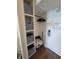 Hall closet with shelves, storage bins, a rod for hanging, and a safe at 1207 S Ocean Blvd. # 20806, Myrtle Beach, SC 29577