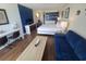 Cozy living room with modern decor, comfortable seating, and a well-lit workspace at 1207 S Ocean Blvd. # 20806, Myrtle Beach, SC 29577