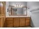 Bathroom featuring a spacious vanity with storage and large mirror at 124 Wicklow Way, Pawleys Island, SC 29585