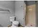 Bathroom with a toilet and walk-in shower at 124 Wicklow Way, Pawleys Island, SC 29585