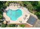 Aerial view of community pool, featuring lounge chairs and umbrellas; perfect for hot summer days at 125 Foxford Dr., Conway, SC 29526