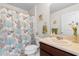 Cozy bathroom featuring a seashell-themed shower curtain and modern fixtures at 125 Foxford Dr., Conway, SC 29526