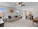 Open concept living space with comfortable seating, a dining table, and a sliding glass door at 125 Foxford Dr., Conway, SC 29526