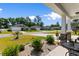 View of a quiet neighborhood street with well-maintained lawns and sidewalks at 125 Foxford Dr., Conway, SC 29526