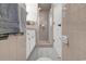Clean bathroom features a walk-in shower, white sink cabinet, and neutral-tone tile at 1305 Forest View Rd., Conway, SC 29526
