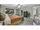Calm bedroom retreat with a ceiling fan, and a doorway to the bathroom and walk-in closet at 1305 Forest View Rd., Conway, SC 29526
