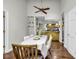 Open dining area with hardwood floors, vaulted ceiling, and view of the updated kitchen at 1305 Forest View Rd., Conway, SC 29526