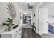 Inviting entryway with tile floors, stylish decor, and view into a living space with modern furnishings at 1305 Forest View Rd., Conway, SC 29526