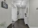Welcoming entryway features tile flooring, white doors, and provides access to other rooms in the home at 1305 Forest View Rd., Conway, SC 29526