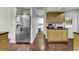 Kitchen with stainless steel appliances, wood cabinets, and hardwood floors at 1305 Forest View Rd., Conway, SC 29526