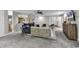 Open living area showing access to the kitchen and other living spaces with ample natural light at 1305 Forest View Rd., Conway, SC 29526