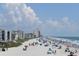 Scenic beach view with people enjoying the sun, sand, and ocean waves at 134 Butkus Dr. # 7, Myrtle Beach, SC 29588