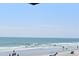 Relaxing beach scene with clear blue water and the sound of crashing waves at 134 Butkus Dr. # 7, Myrtle Beach, SC 29588