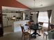 Bright eat-in kitchen with white cabinets, offering a modern and functional space at 134 Butkus Dr. # 7, Myrtle Beach, SC 29588
