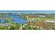Beautiful aerial view of condos nestled among lakes, trees, and the ocean at 145 South Dunes Dr. # 308, Pawleys Island, SC 29585