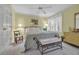Relaxing bedroom with natural light, ceiling fan, and light yellow walls at 145 South Dunes Dr. # 308, Pawleys Island, SC 29585