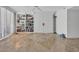 Bright living room featuring travertine floors and built-in bookcase and storage at 145 South Dunes Dr. # 308, Pawleys Island, SC 29585