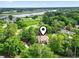 Aerial view of a beautiful neighborhood with manicured greenery, with a river in the background at 1501 Harbor Dr., North Myrtle Beach, SC 29582