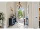Inviting foyer with tile flooring, elegant chandelier, and stylish decor at 1501 Harbor Dr., North Myrtle Beach, SC 29582