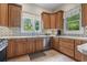 Bright kitchen with stainless appliances, tiled backsplash and natural wood cabinetry at 1501 Harbor Dr., North Myrtle Beach, SC 29582