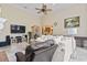 Spacious living room featuring tile floors, neutral tones, and comfortable seating area at 1501 Harbor Dr., North Myrtle Beach, SC 29582