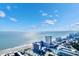 Aerial view displaying a coastal city with various hotels, and the beach along the ocean's edge at 1501 S Ocean Blvd. # 351, Myrtle Beach, SC 29577