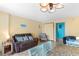 Relaxing living area with couch, chair, breakfast nook and beach themed wall decor at 1501 S Ocean Blvd. # 351, Myrtle Beach, SC 29577