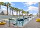Refreshing outdoor pool featuring a 3ft deep end, playful dolphin fountain, and beautiful palm trees at 1501 S Ocean Blvd. # 351, Myrtle Beach, SC 29577