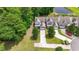 Aerial view of a well-maintained home with a manicured lawn and driveway at 1535 Harlow Ct., Myrtle Beach, SC 29579
