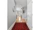 Inviting hallway with hardwood floors and neutral walls, offering a glimpse into the living spaces at 1535 Harlow Ct., Myrtle Beach, SC 29579