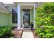 Inviting front entrance with well-manicured landscaping provides a warm welcome at 1635 Southwood Dr., Surfside Beach, SC 29575