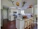 Well-equipped kitchen featuring stainless steel appliances, granite countertops, and custom cabinetry at 1635 Southwood Dr., Surfside Beach, SC 29575