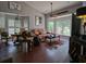 Open living area features vaulted ceilings, dark wood floors, and an inviting seating arrangement at 1635 Southwood Dr., Surfside Beach, SC 29575